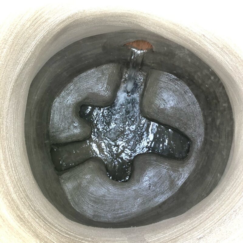 Brick manhole after bench reconstruction and SewperCoat application