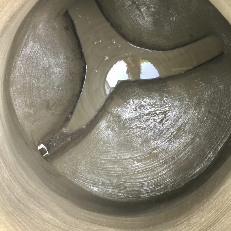 Brick manhole after SewperCoat rehabilitation with completed protective lining